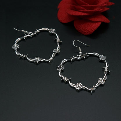 Thorned heart earrings